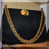 H09. Rhinestone lion purse. 